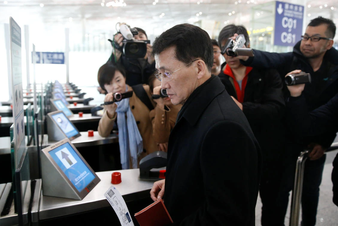 North Korean diplomat Choe Kang Il enters the departure area to board a flight to Helsinki at Capital International Airport in Beijing, China March 18, 2018. (Reuters/Thomas Peter)