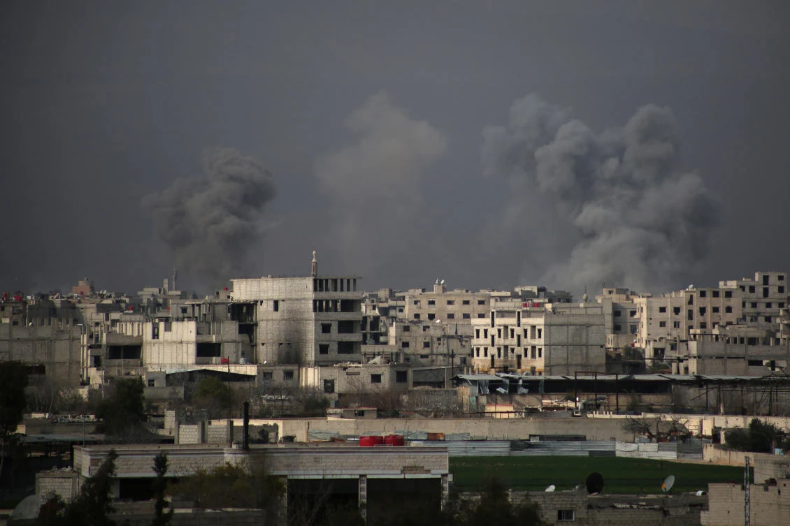Smoke billows following Syrian government bombardment on the rebel-held besieged town of Harasta, in the Eastern Ghouta region on the outskirts of Damascus on March 10, 2018. (Ammar Suleiman/AFP)
