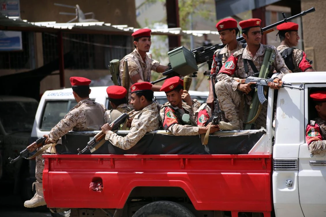 Yemeni military policemen patrol the streets of the city of Taiz, on March 13, 2018. (AFP)