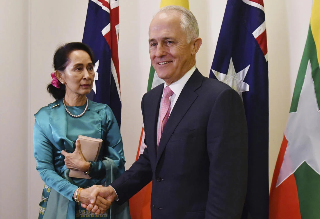 Myanmar’s Suu Kyi welcomed to Australia amid protests