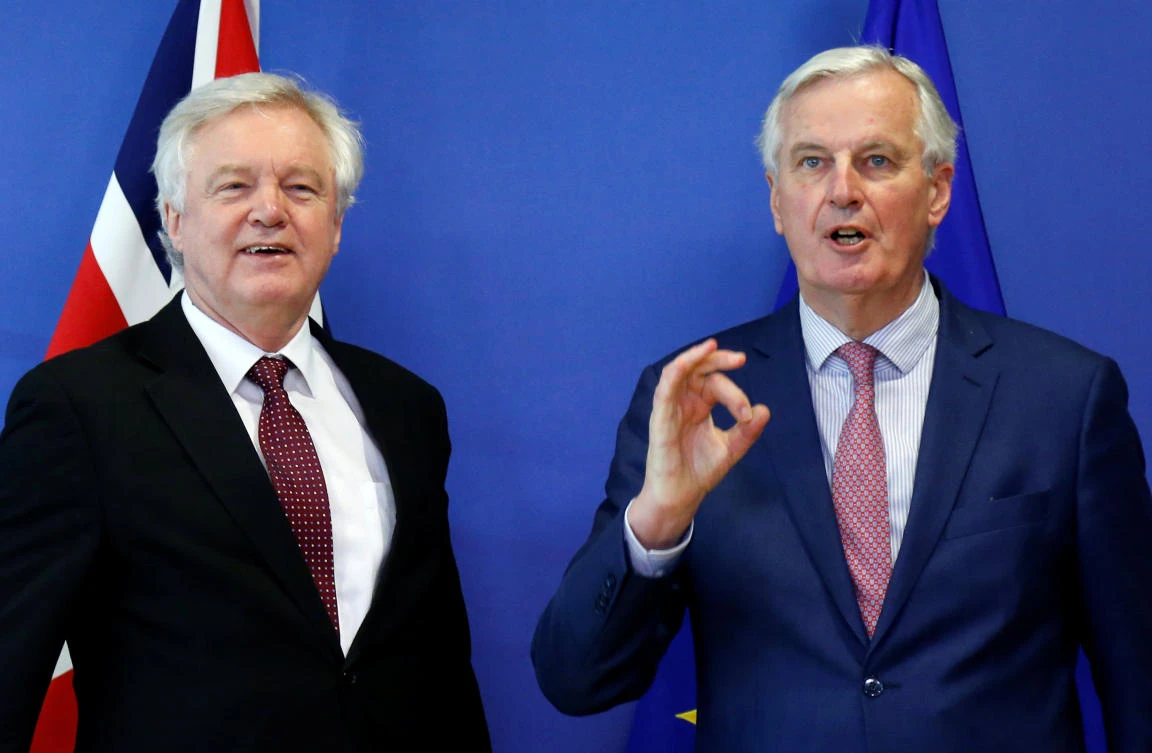 British Brexit Secretary David Davis, left, and EU’s chief Brexit negotiator Michel Barnier pose ahead of a meeting in Brussels on Monday, March 19. (Reuters)