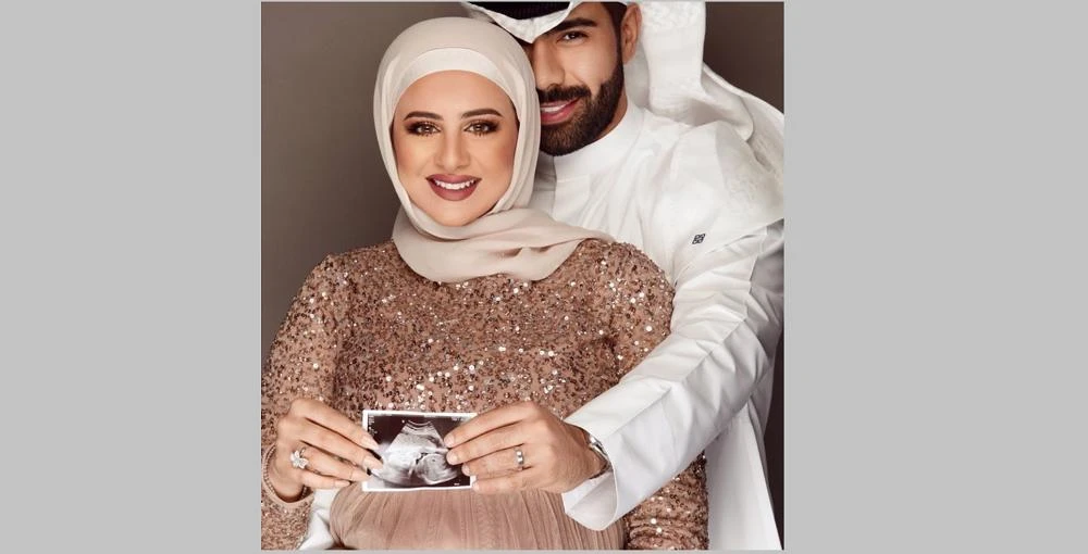 This seemingly innocent family photo of a happy couple has sparked fury