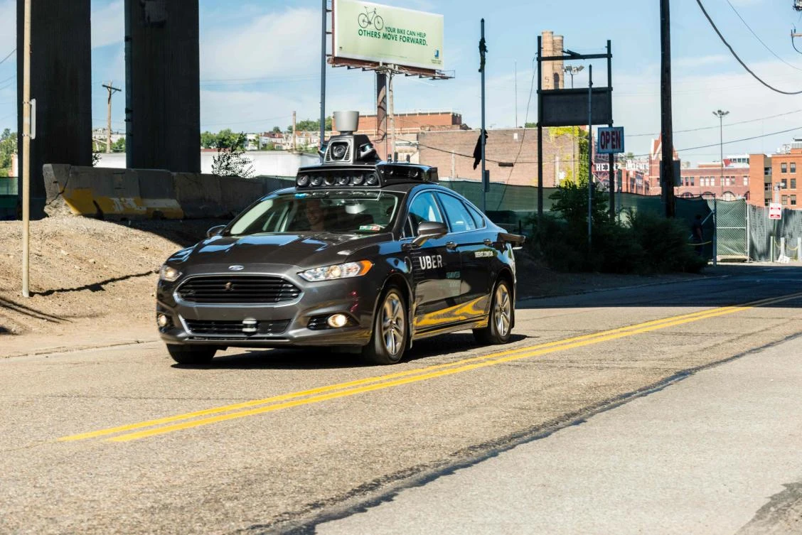 Uber self-driving tests halted after pedestrian dies in Arizona