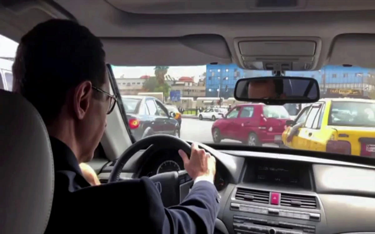 Videos show an assured Assad driving himself to Syria battle