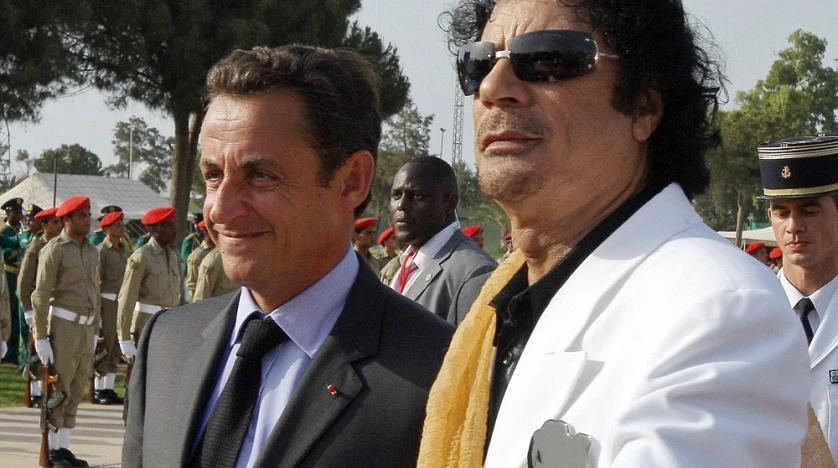 Muammar Qaddafi receives Nicolas Sarkozy in Tripoli in 2007. French investigators are examining claims that Qaddafi’s regime secretly gave Sarkozy €50 million for his 2007 presidential campaign. (AFP)