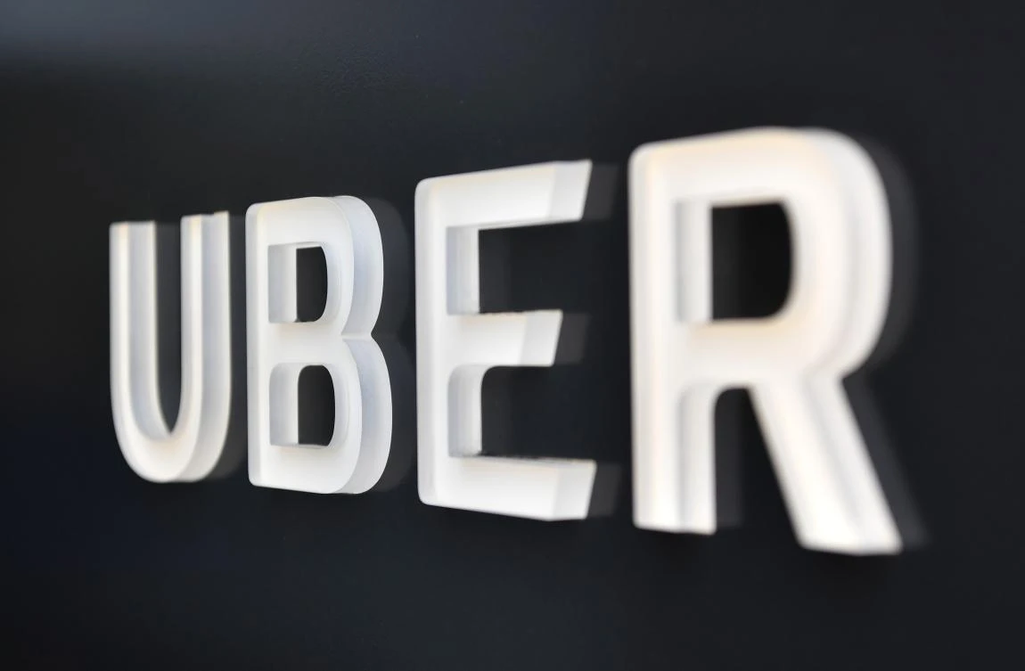 The Uber logo is seen outside the Uber Corporate Headquarters building in San Francisco, California. (AFP)