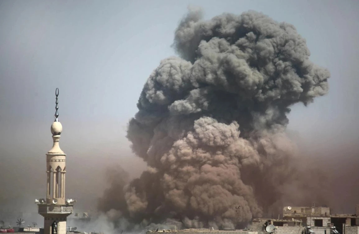 A picture taken on Mar 20, 2018 shows smoke plumes rising during regime bombardment in the rebel-held town of Arbin in the Eastern Ghouta enclave, outside the capital Damascus, as Syrian pro-government troops push in an offensive against it. (AFP)