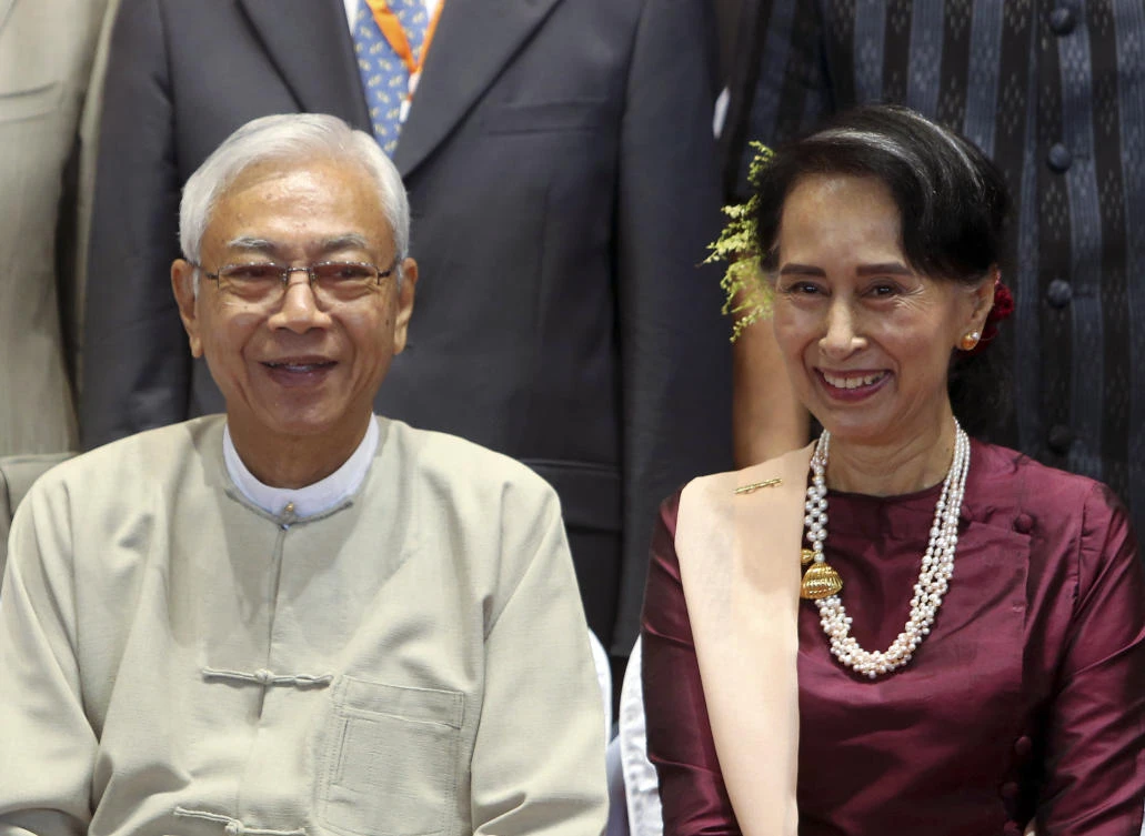 Myanmar’s President Htin Kyaw, left, and Myanmar’s State Counsellor Aung San Suu Kyi attend at the Myanmar International Convention Center in Naypyitaw in this October 2017. (AP)