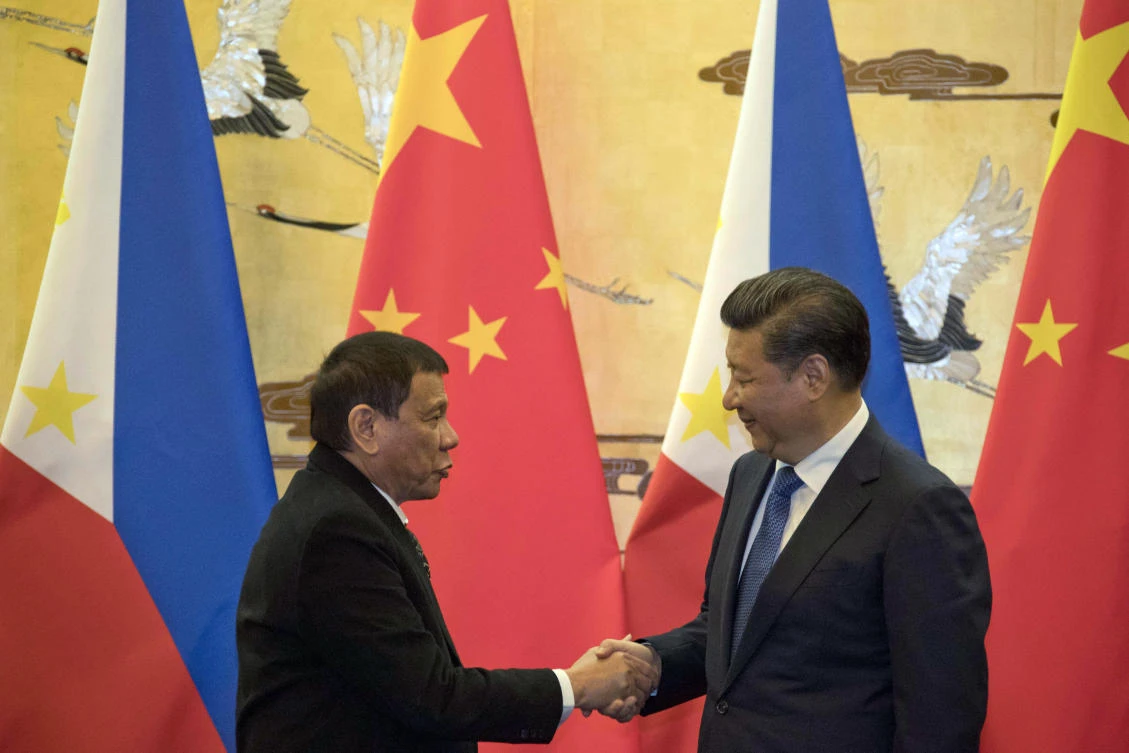Chinese president Xi Jinping greets Philippine president Rodrigo Duterte during the latter’s state visit in October 2016. China is working with the 10 members of the Association of Southeast Asian Nations to reach a code of conduct to avoid frictions while operating in the area. (AP)