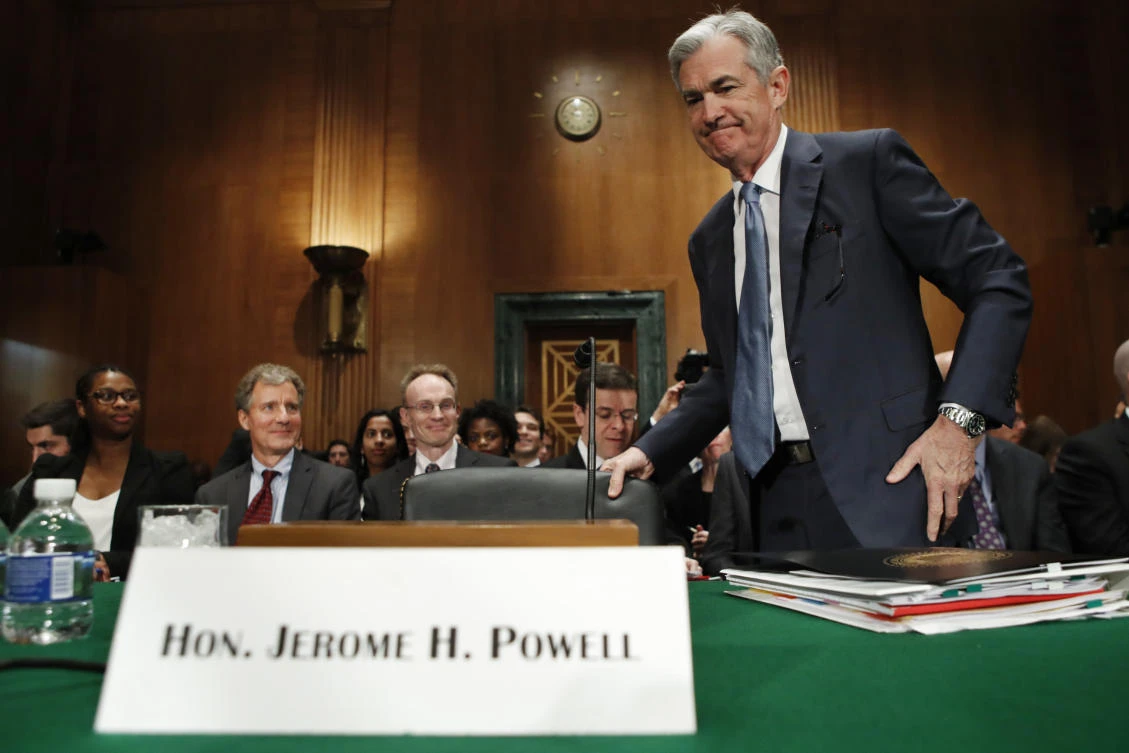 Federal Reserve Chairman Jerome Powell takes his seat before making the semiannual monetary policy report to the Senate Banking Committee on Capitol Hill in Washington. (AP)