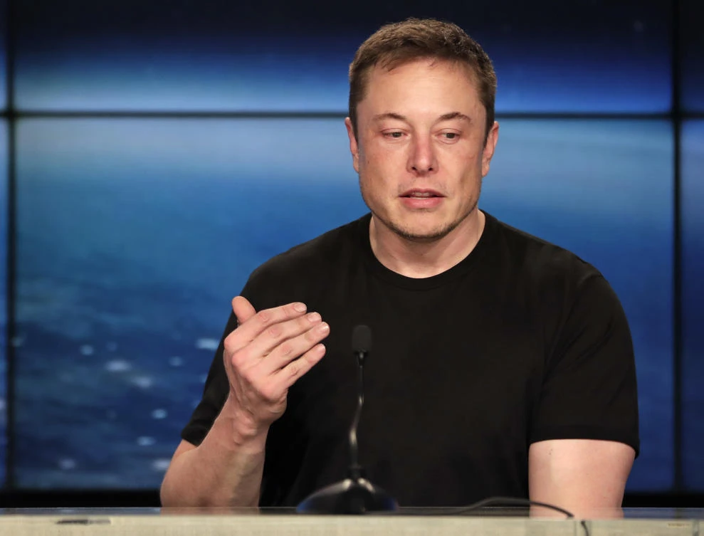 FILE- In this Feb. 6, 2018, file photo, Elon Musk, founder, CEO of SpaceX and CEO of Tesla Inc., speaks at a news conference after the Falcon 9 SpaceX heavy rocket launched successfully from the Kennedy Space Center in Cape Canaveral, Fla. Shareholders of electric car and solar panel maker Tesla Inc. are voting on a pay package for Musk that could net him more than $50 billion if he meets lofty milestones over the next decade that include raising the company's market value tenfold. (AP Photo/John Raoux, File)