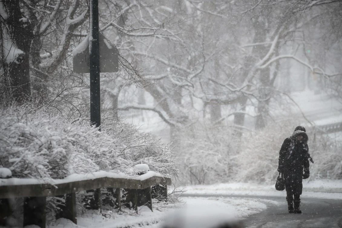 A woman walks through a snowstorm in New York City. (Getty Images/AFP)