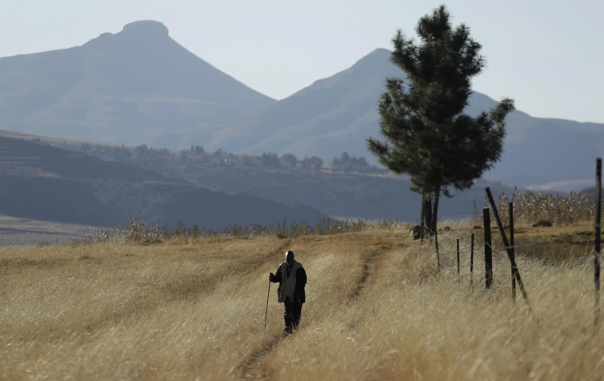 The World Travel and Tourism Council says it has seen a recovery in markets such as Africa. Above, a man walks on the land at Ha Mampho village, Lesotho. (AP)