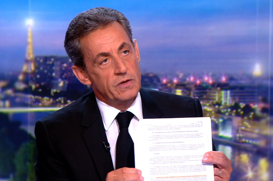 This video grab taken from footage released by French television channel TF1 shows French former president Nicolas Sarkozy speaking during an interview on March 22, 2018 at the TF1 headquarters in Boulogne-Billancourt, a day after he was charged on corruption over allegations that late Libyan dictator funded his 2007 presidential election campaign, one of France’s most explosive political scandals in years. (AFP)