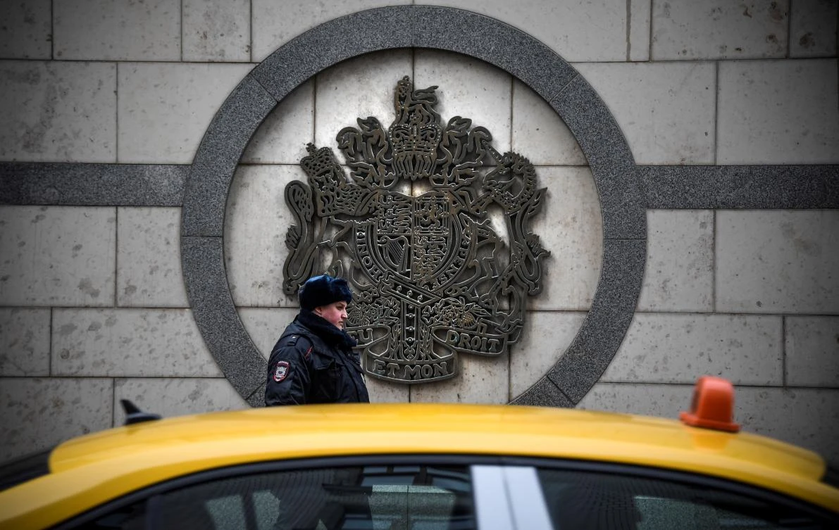 A police officer patrols outside the British embassy building in Moscow. (Alexander Nemenov/AFP)