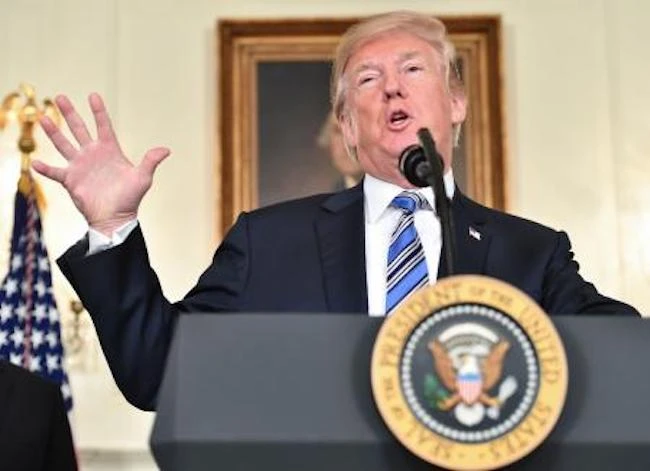 US President Donald Trump speaks about the spending bill during a press conference in the Diplomatic Reception Room at the White House on Mar. 23, 2018. (AFP)