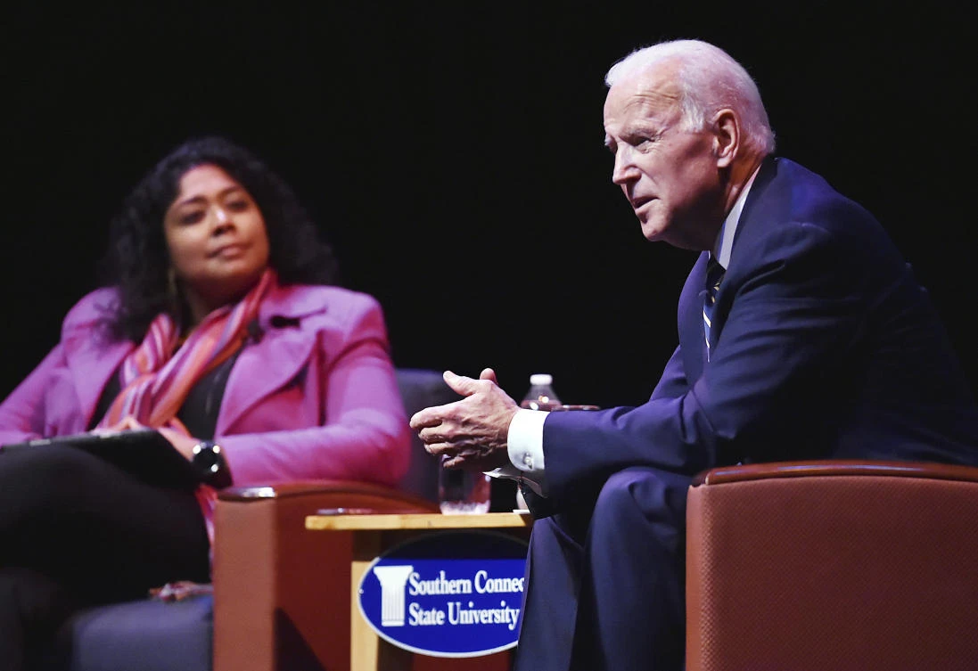 Former US Vice President Joe Biden speaks during a moderated conversation with WNPR’s Lucy Nalpathanchil, left, at the annual Mary and Louis Fusco Distinguished Lecture Series at Southern Connecticut State University, Friday, March 23, 2018, in New Haven, Connecticut (AP)