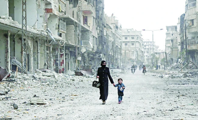Tens of thousands have fled their homes in the past week as the bombardment of the Syrian city of Douma intensified. (AFP)