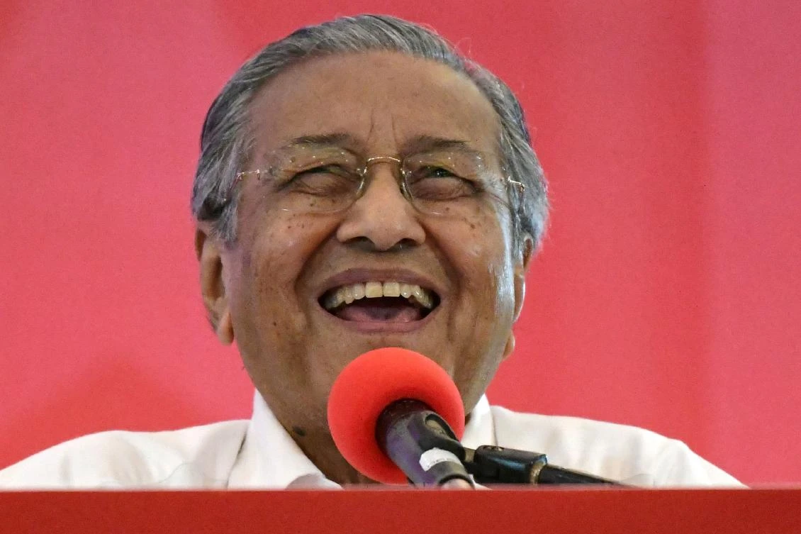 This file picture taken on March 8, 2018 shows former Malaysian prime minister and opposition’s prime ministerial candidate Mahathir Mohamad smiling. (AFP)