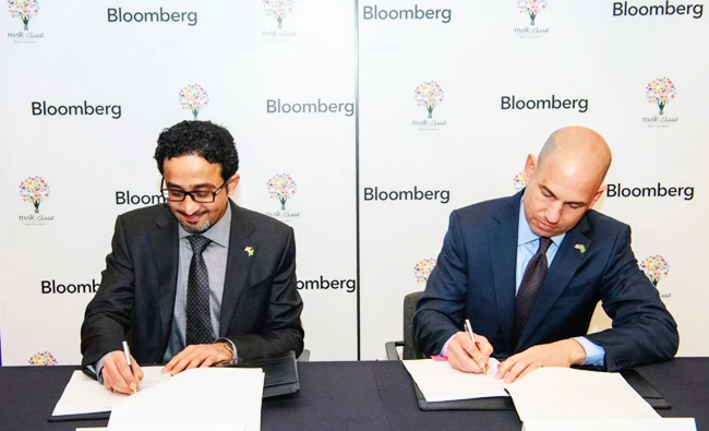 Bader Al Asaker, Chairman of the Board of Misk Initiatives Center and Joshua L. Steiner, Head of Industry Verticals, Bloomberg L.P., after signing a memo of understanding at Bloomberg L.P. Headquarters in New York. March 27, 2018. (Photo credit: MiskKSA)