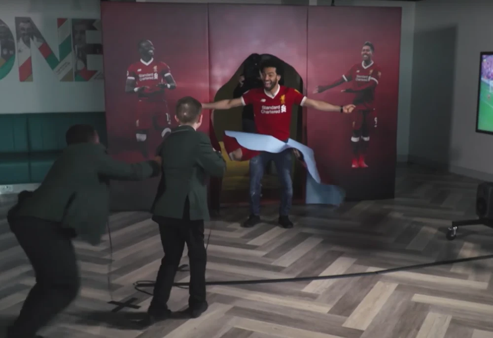 Liverpool Football Club TV has published a video of Mohamed Salah surprising a number of youngsters at Anfield. (Screenshot)
