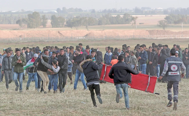 Abbas calls on UN to protect Palestinians after Israeli troops kill 16 protesters