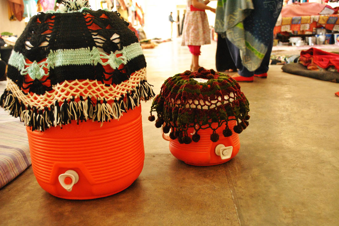 Some women knitted these covers for their water cooler.