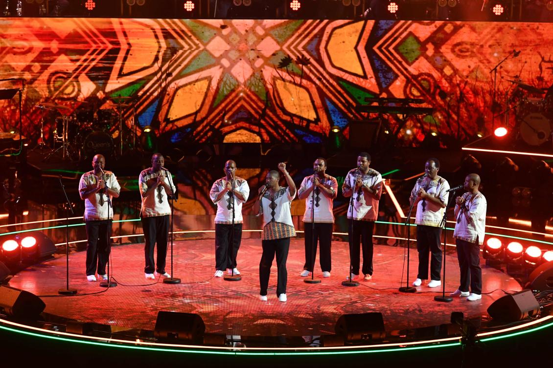 South African male choral group Ladysmith Black Mambazo perform at The Queen's Birthday Party concert at the Royal Albert Hall in London on April 21, 2018 on the occassion of Britain's Queen Elizabeth II's 92nd birthday. / AFP / POOL / John Stillwell