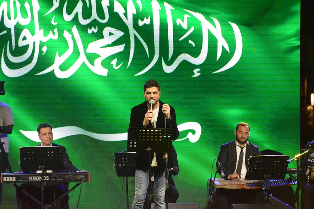 Iraqi star Waleed Al-Shami performs at the concert.