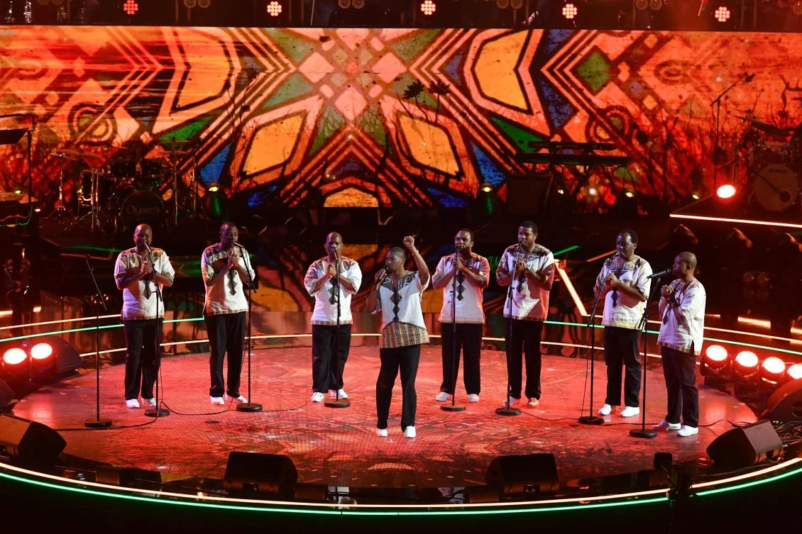 South African male choral group Ladysmith Black Mambazo perform at The Queen's Birthday Party concert at the Royal Albert Hall in London on April 21, 2018 on the occassion of Britain's Queen Elizabeth II's 92nd birthday. / AFP / POOL / John Stillwell
