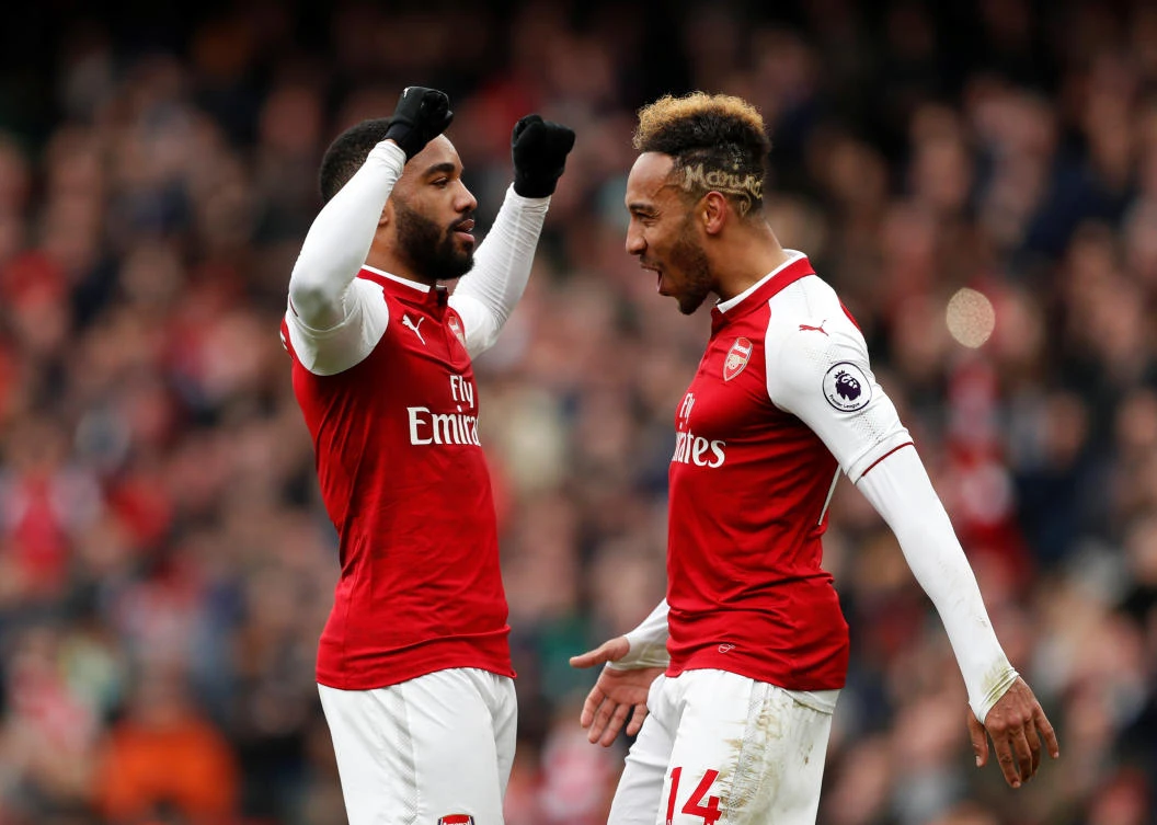 Arsenal's Alexandre Lacazette celebrates scoring their third goal with Pierre-Emerick Aubameyang. (REUTERS)