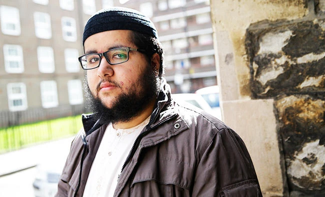In this photo taken on March 23, 2018, Farooq, who declined to give his last name poses for a portrait outside a health surgery in London. (AP)