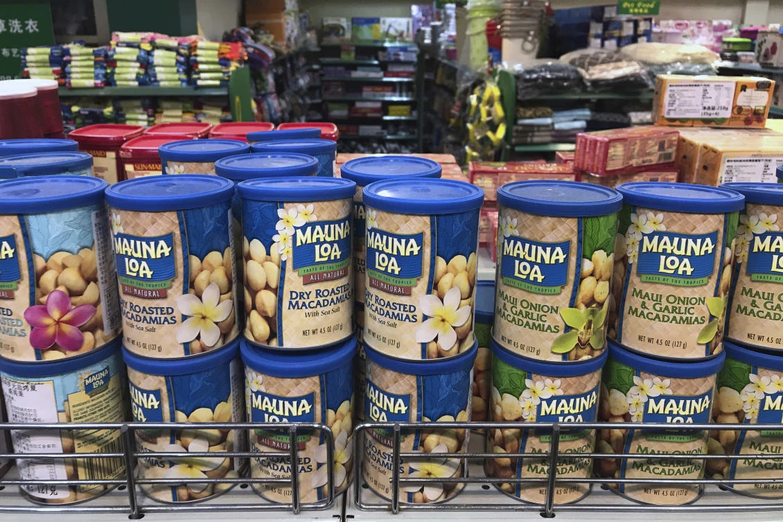 Imported nuts from the United States are displayed for sale at a supermarket in Beijing, Monday, April 2, 2018. China raised import duties on US pork, fruit and other products Monday in an escalating tariff dispute with President Donald Trump that companies worry might depress global commerce. (AP/Andy Wong)