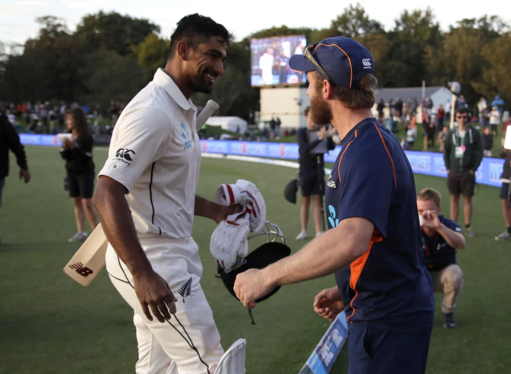 New Zealand's Ish Sodhi is greeted by his captain Kane Williamson, R, as he leaves the field at the end of play after helping to save the second Test at Hagley Oval in Christchurch. (AP)