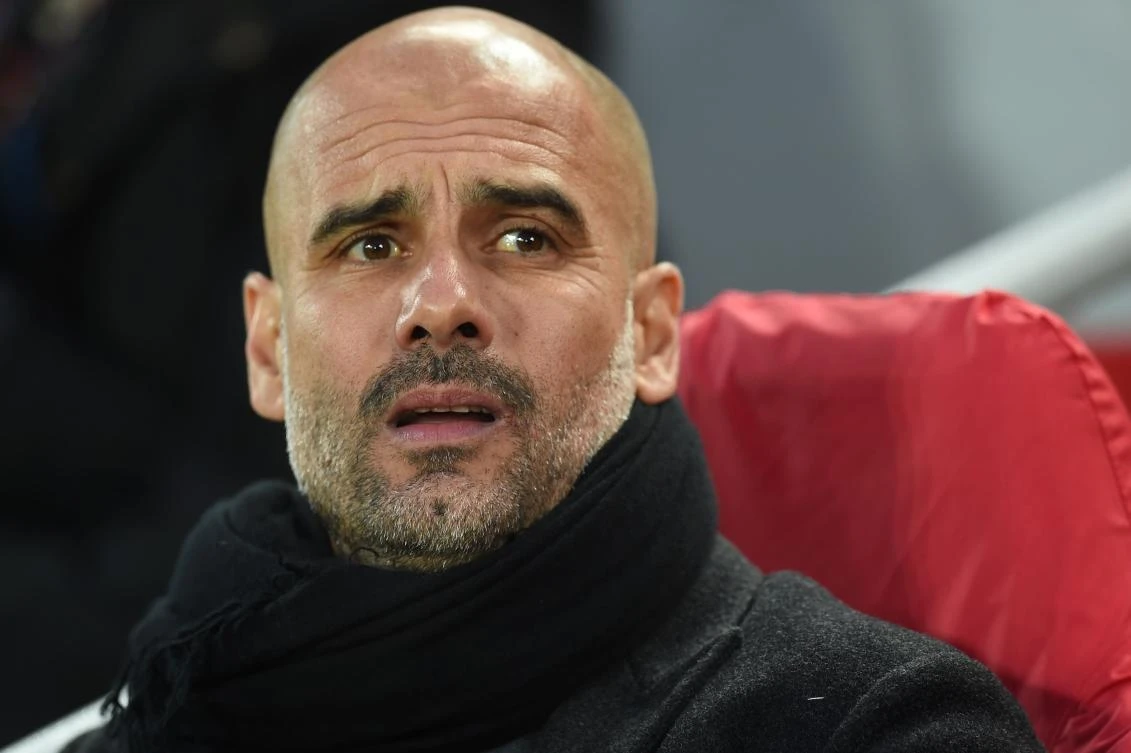 Pep Guardiola looks on during the UEFA Champions League first leg quarter-final defeat to Liverpool. (AFP)