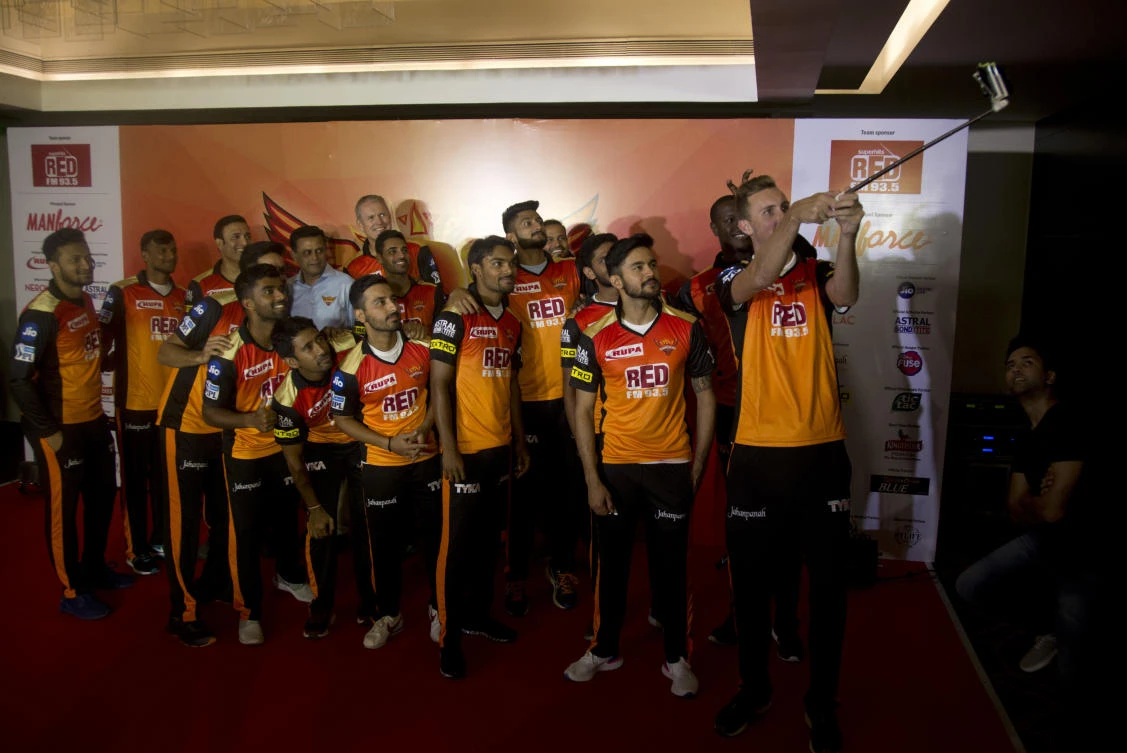 Sunrisers Hyderabad cricket player Alex Hales takes a selfie with team members during the unveiling of the team's new signings in Hyderabad. (AP)