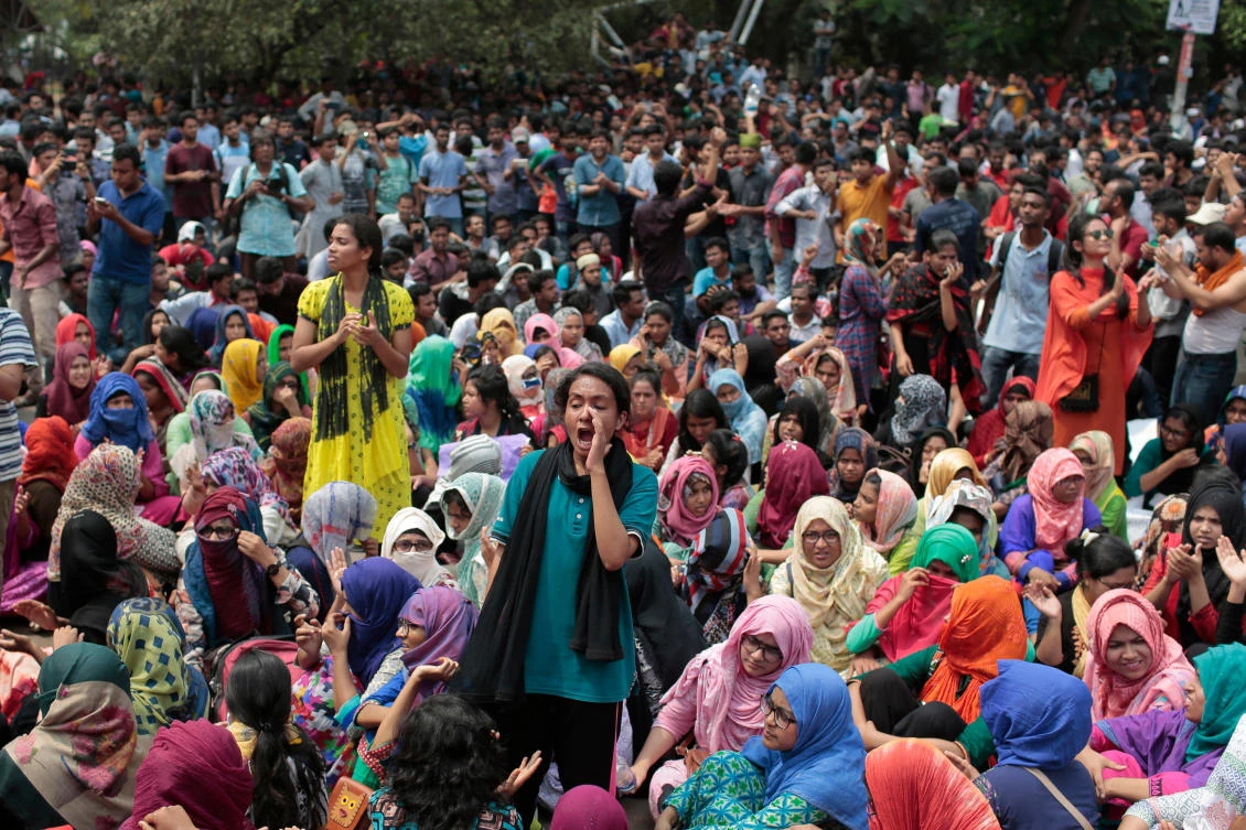 Bangladeshi students shout slogans during a protest for removing or reforming a quota system in government jobs in Dhaka, Bangladesh. (AP)