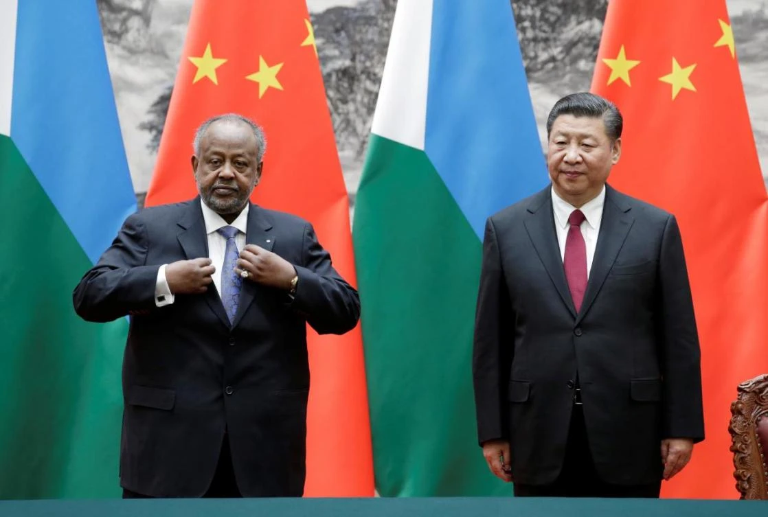 Chinese President Xi Jinping, right, and Djibouti’s President Ismail Omar Guelleh at the Great Hall of the People in Beijing, last year. China built an electrified rail line linking the Ethiopian capital of Addis Ababa with Djibouti, as the former French colony aims to become a global shipping power. (Reuters)
