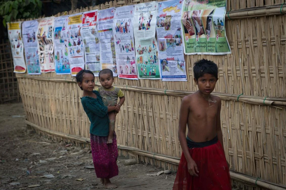 This photograph taken on March 10, 2018, Rohingya children are seen at Shan Taung village in the outskirt of Mrauk U township located in Rakhine State close to Bangladesh border. (AFP)