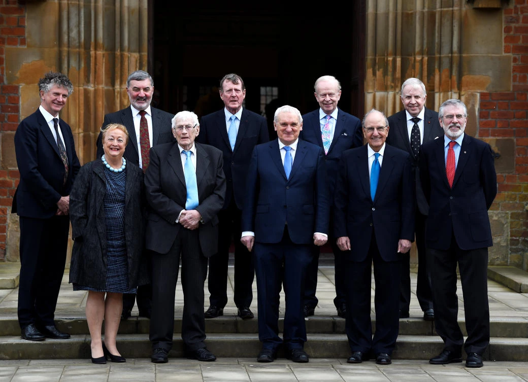 (Front L-R) Monica McWilliams, Seamus Mallon, Bertie Ahern, former US Senator George Mitchell and Gerry Adams. (Back L-R) Jonathan Powell, John Alderdice, David Trimble, Reg Empey and Paul Murphy stand for a group photograph at an event to celebrate the 20th anniversary of the Good Friday Agreement, in Belfast, Northern Ireland. (Reuters)