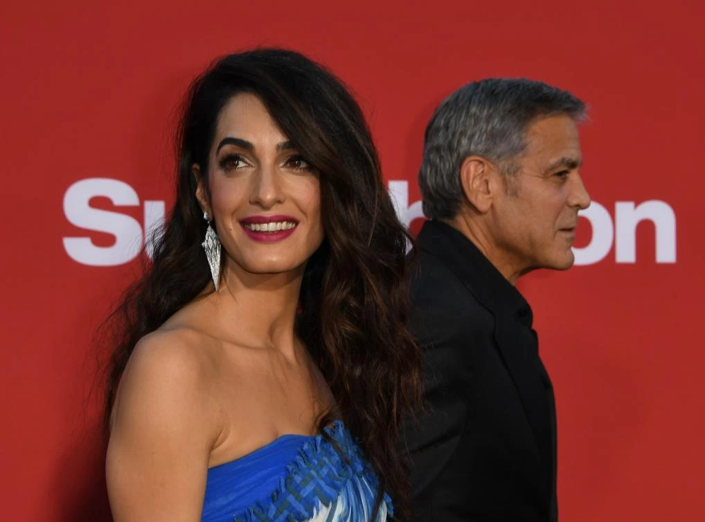 Amal Clooney poses for Vogue