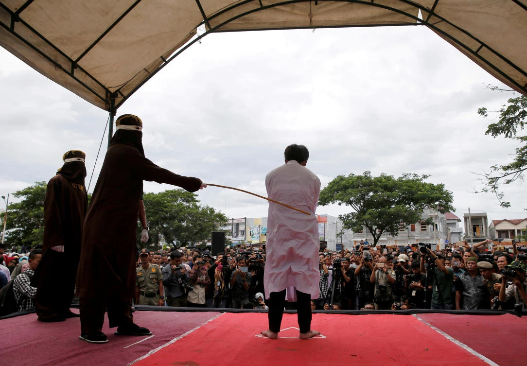 Indonesia’s conservative Aceh province to restrict access to public floggings