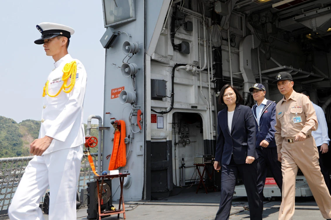Taiwanese President Tsai Ing-wen walks on board the Kee Lung (DDG-1801) destroyer during a drill near Yilan naval base on Friday, April 13. (Reuters)