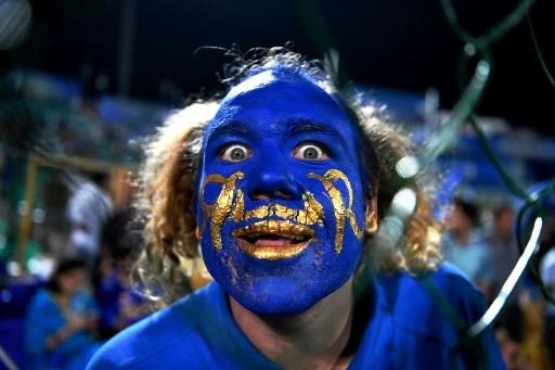 A Rajasthan Royals fan with his face painted with the team's crest looks on during the match with the Delhi Daredevils. (AFP)