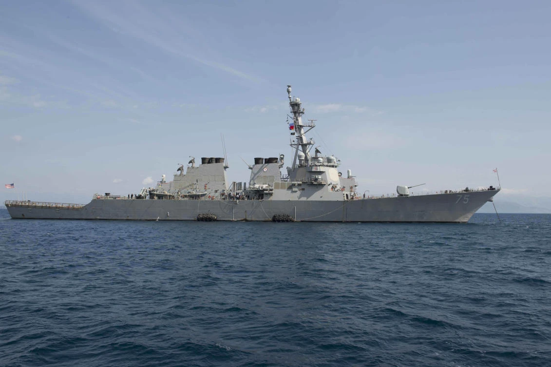 A French frigate, UK Royal Navy submarines laden with cruise missiles and the USS Donald Cook, above, an American destroyer equipped with Tomahawk land attack missiles, have all moved into range of Syria’s sun-bleached coast. (AFP)