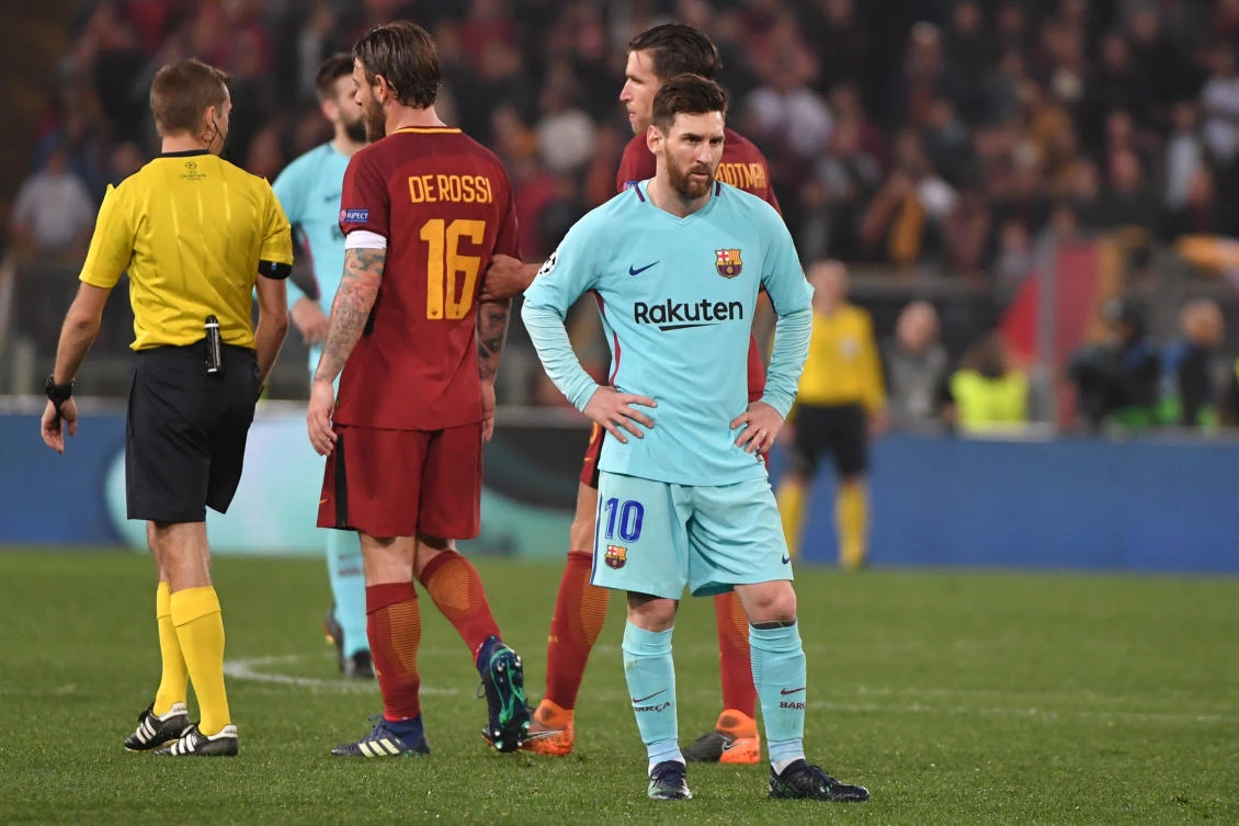 Lionel Messi looks downcast after Barca's shock 3-0 defeat in Rome