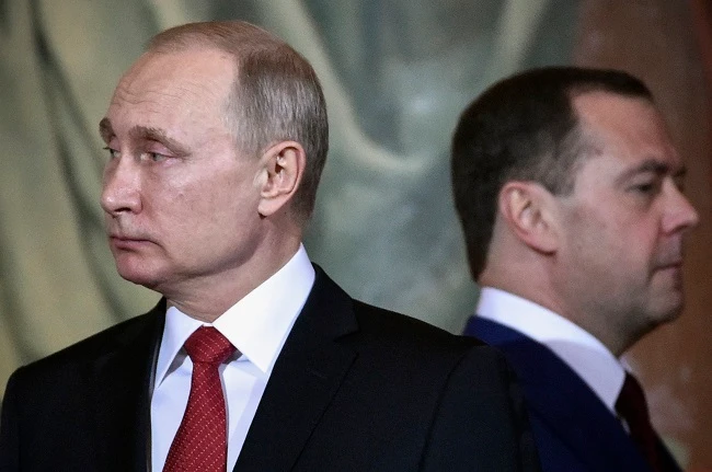 Russian President Vladimir Putin (L) and Prime Minister Dmitry Medvedev. (AFP)
