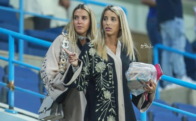 The partners of Al-Hilal midfield Nicolás Milesi and forward Ezequiel Cerutti arrive at the King Fahd Stadium in Riyadh during the Al-Hilal and Al-Fateh match.