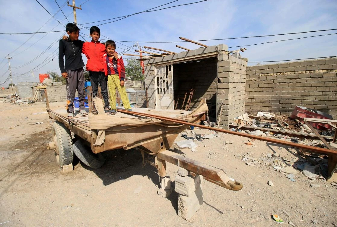 At least 18 percent of Iraqi youth are unemployed, with rates even higher among college graduates. Above, Iraqi boys on a trailer in Al-Zubair, south of Basra. (AFP)