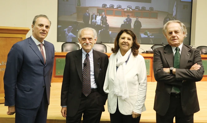 Italian Ambassador Luca Ferrari, left, and Enzo Benigni, chairman and chief executive of Elettronica, right, with other participants at a workshop in Riyadh on Thursday. (AN photo)
